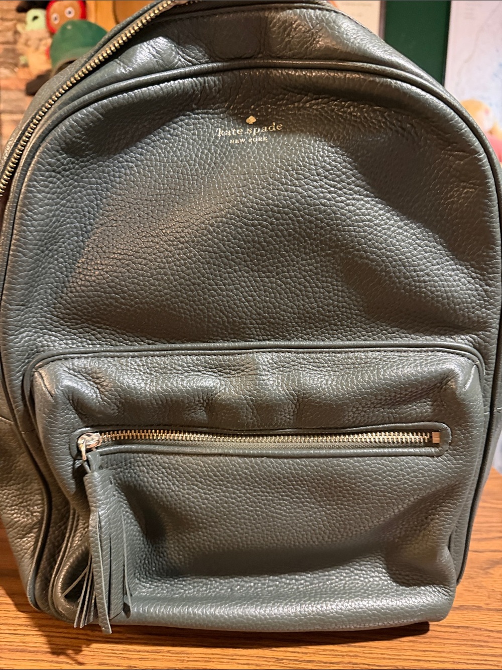 kate spade Pebbled Leather Backpack in Olive green with Tassel